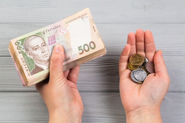 Stack of ukrainian hryvnia banknotes in hands