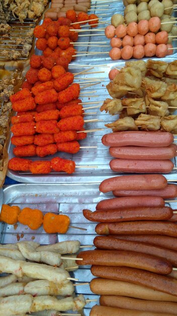 Stack of vegetables for sale in market