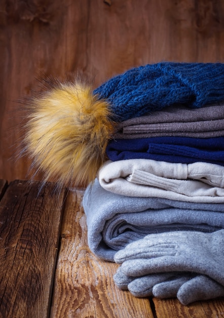 Stack of warm knitted clothes