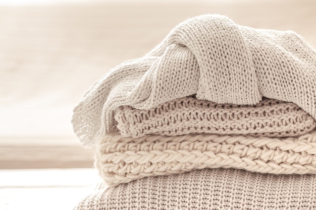 A stack of warm knitted items