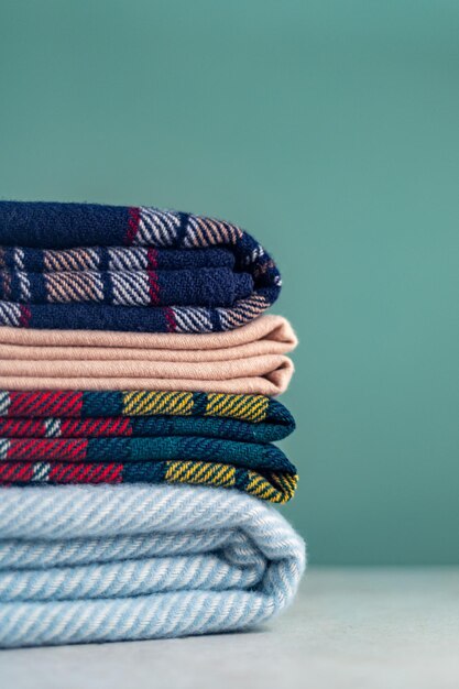 Stack of woolen checked blankets