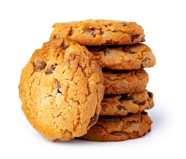 Stacked chocolate chip cookies isolated on white surface