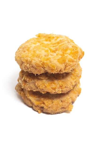 Stacked cornflakes cookies top view isolated on white background clipping path