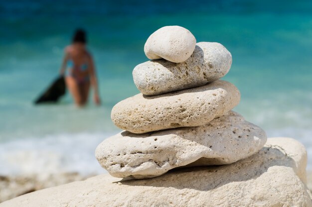 Stacked pebbles on the beach