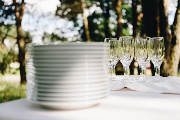 Stacked plates and glasses on a table