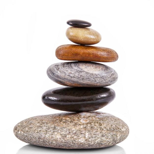 Stacked stones on white background