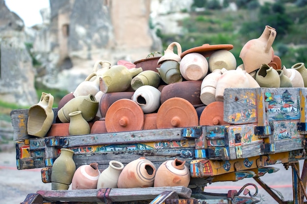 stacked together broken clay pots