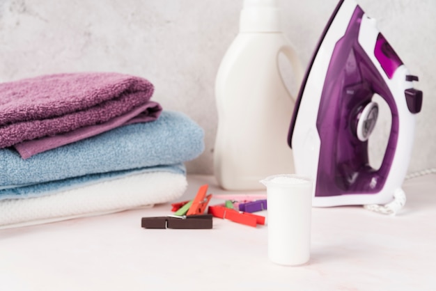 Stacked towels with softener and iron