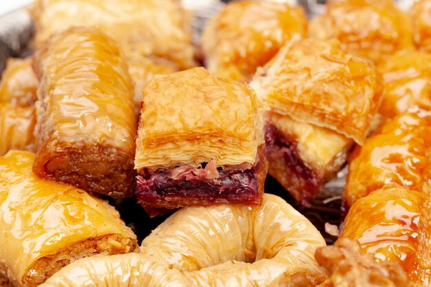 Stacked turkish baklava dessert in a plate close up