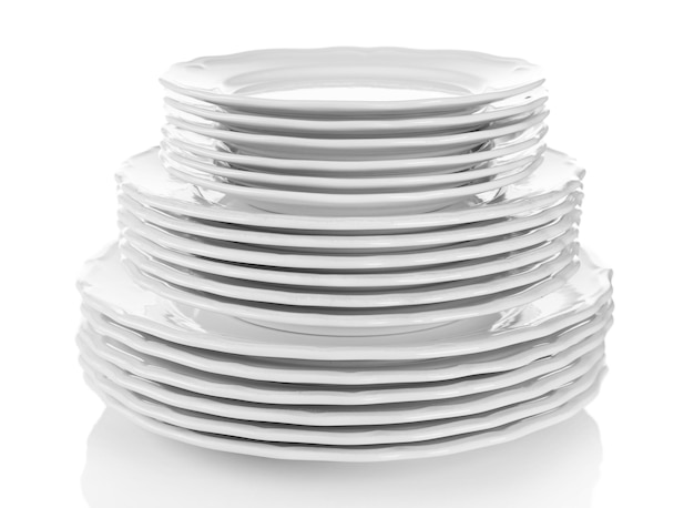 Photo stacked white dishes isolated on white