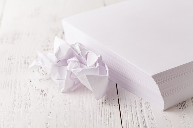 Stacked white paper on white background