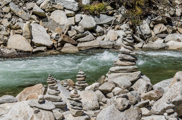 Stacking stones at the water