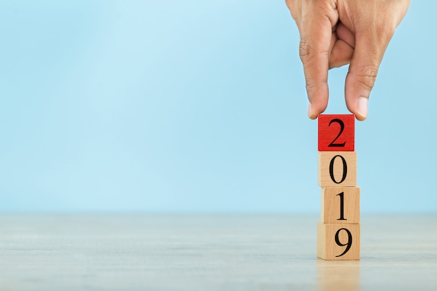 Stacking wooden blocks into steps,Concept 2019 of business growth success