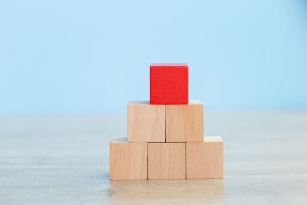 Stacking wooden blocks into steps,Concept of business growth success