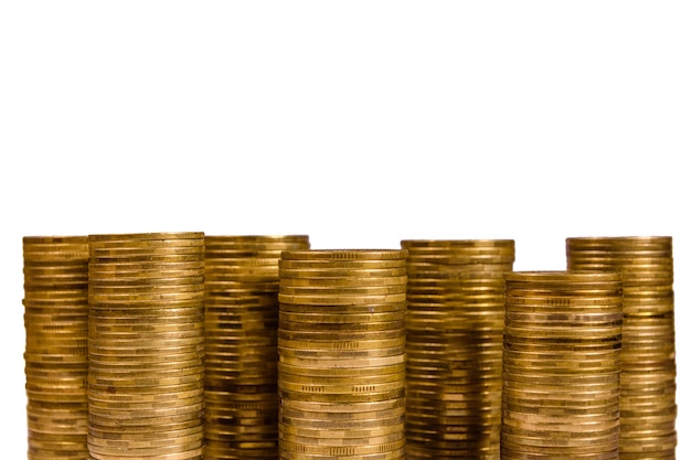 Stacks of the coins isolated on a white background