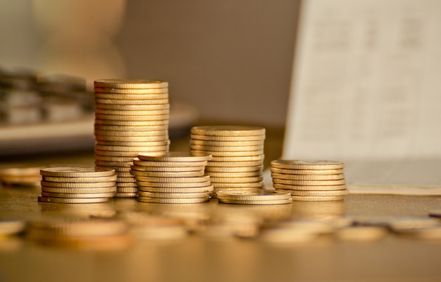 stacks of gold money coin