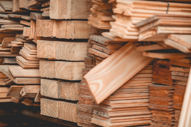 Stacks of logs in warehouse wood texture