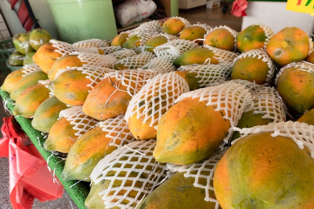 Stacks of papaya at the traditional marketplace in Taiwan