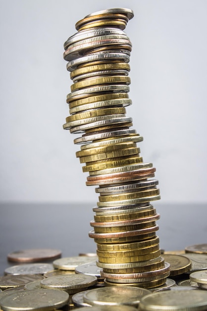 Stacks of Russian coins on a gray background with droplets of water