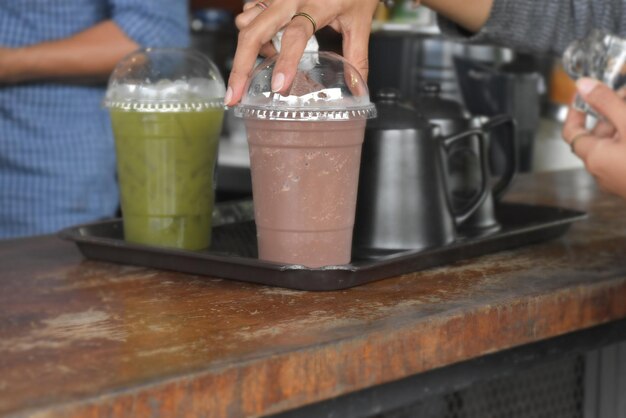 Photo staff prepare to serve cold drinks