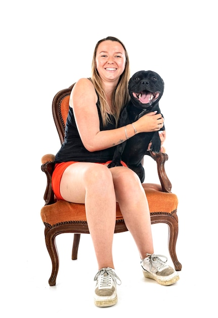 Staffordshire bull terrier and woman