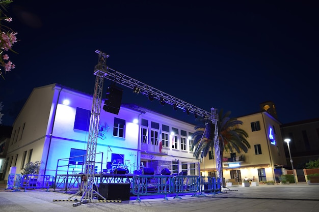 A stage for a music festival in the evening