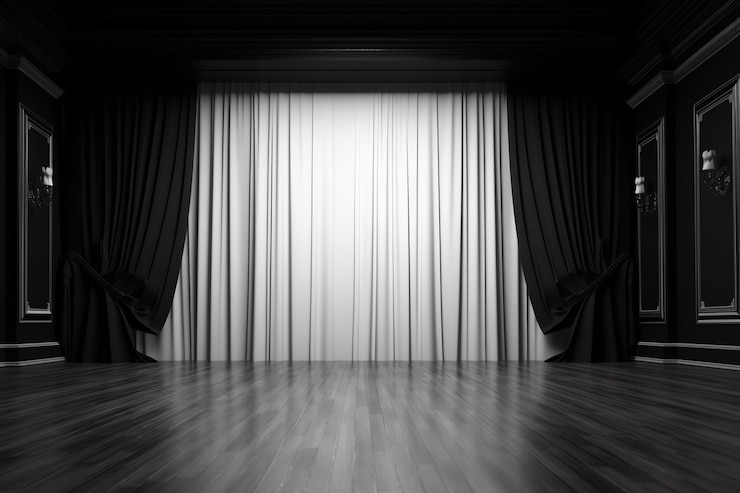 A stage with a white curtain