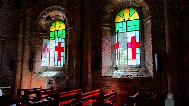 Photo stained arch windows in old church