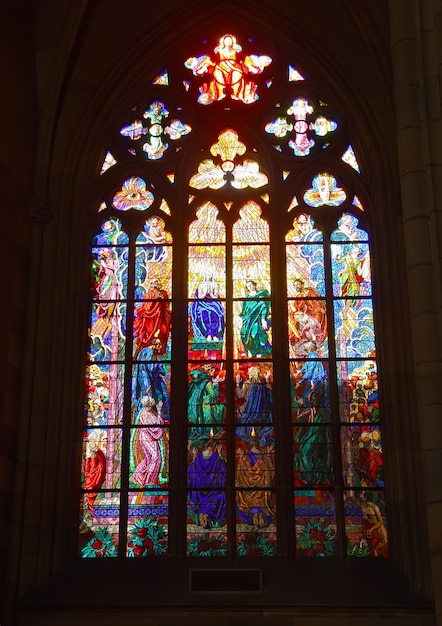 Stained-glass window in Catholic temple. Prague