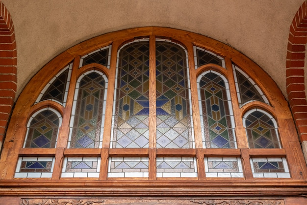 Stained glass window in old cathedral or church.