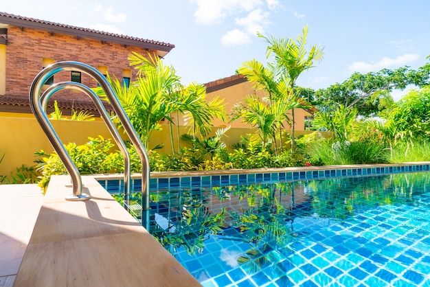 Stainless handrails stair in swimming pool