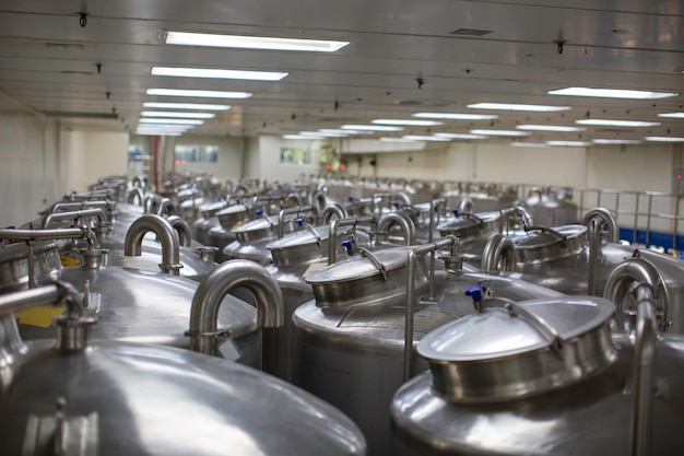 Stainless lid steel tanks with pressure meter in equipment tank
facility for water cleaning and treatment at shampoo plant