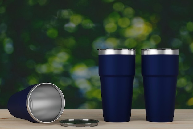 Stainless steel thermos tumbler cup cold mug storage on top wood with green leaf bokeh background 3d rendering