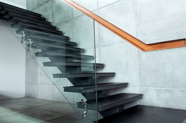 Staircase in modern villa and cement wall