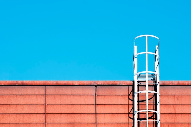 Stairs leading up to the blue sky.