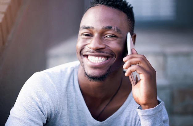 Stairs smile and portrait of black man with phone call for contact communication and connectivity Happy male person and face with technology for digital network discussion and conversation