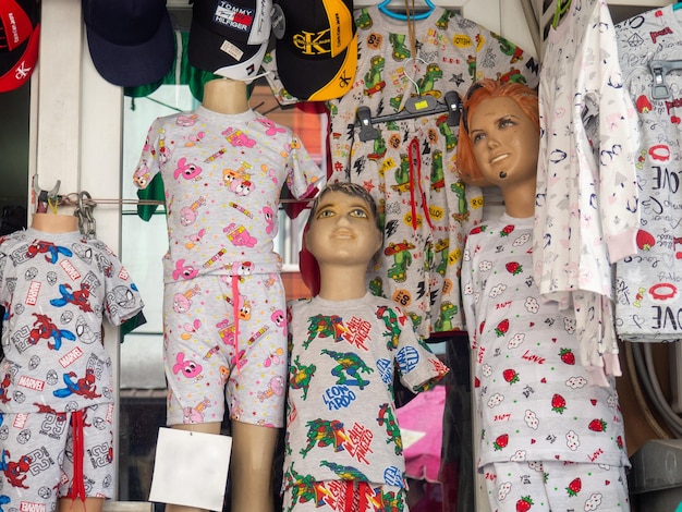 A stall in a street market Market in a Turkish town Sale of clothes Mannequins on the counter