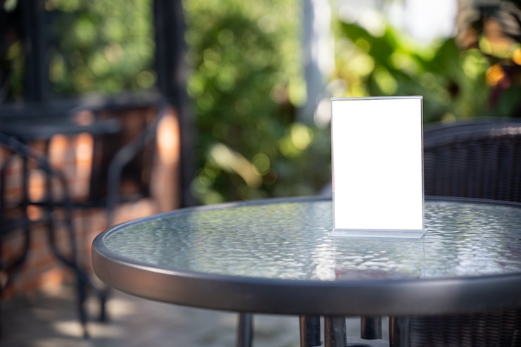 Photo stand mock up menu frame tent card blurred background design key visual layout.