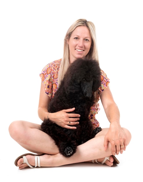 Standard poodle and woman