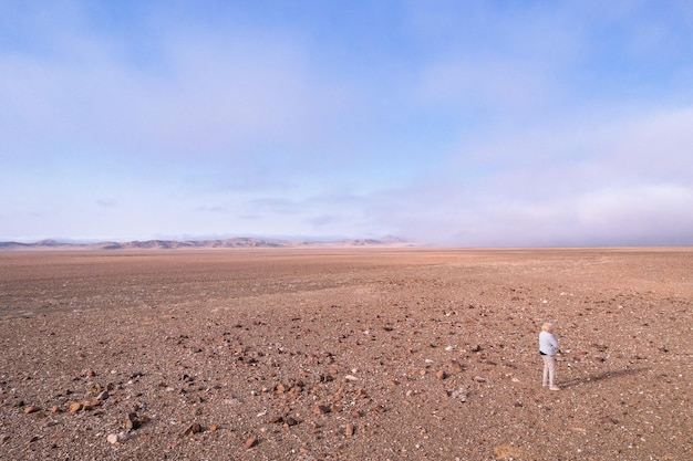 Standing all alone in the vastness of the Hartmans valley with sea mist rolling in