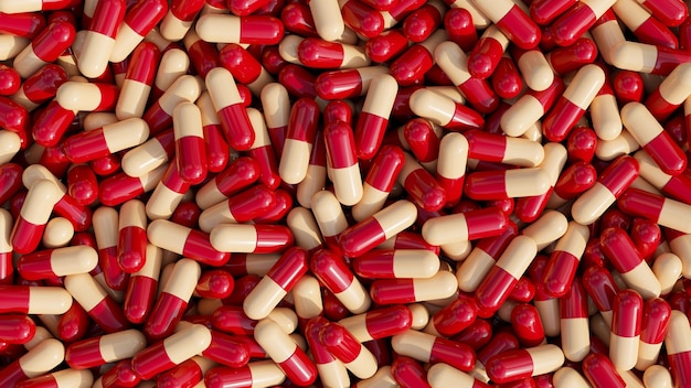 Stapel pillen achtergrond pil capsules in rode en beige kleur drug of vitamine capsules