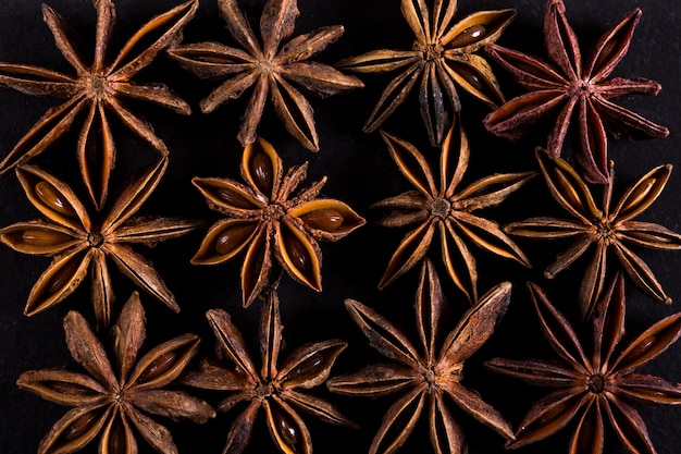 Star anise on black table. , copyspace.