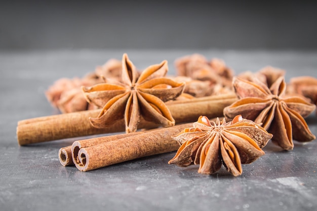 Star anise and cinnamon on the gray background