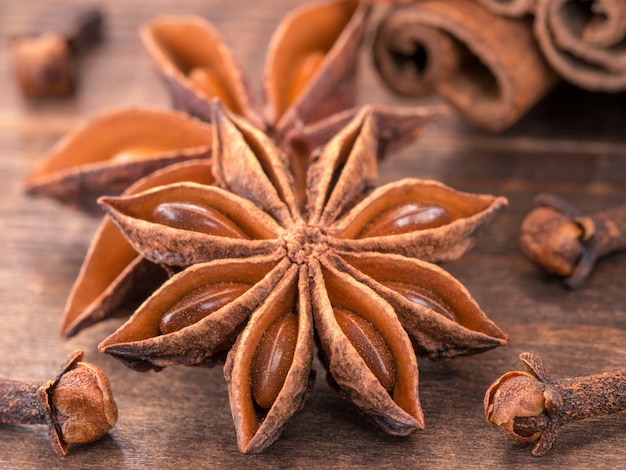 Star anise on wooden background