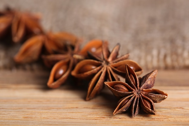 Star anise on wooden background