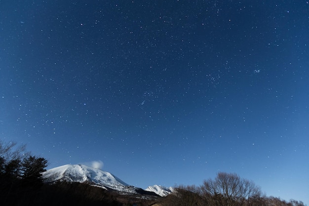 Star cluster with snow mountain