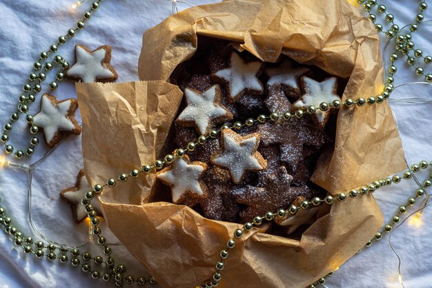 Photo star cookies in a box decorated with a garland