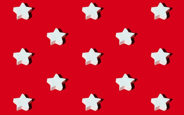 Star pattern red seamless background white figures