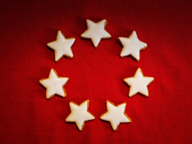 Photo star shape cookies on red fabric