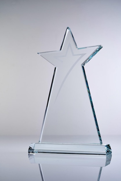 Star shape crystal trophy against white background